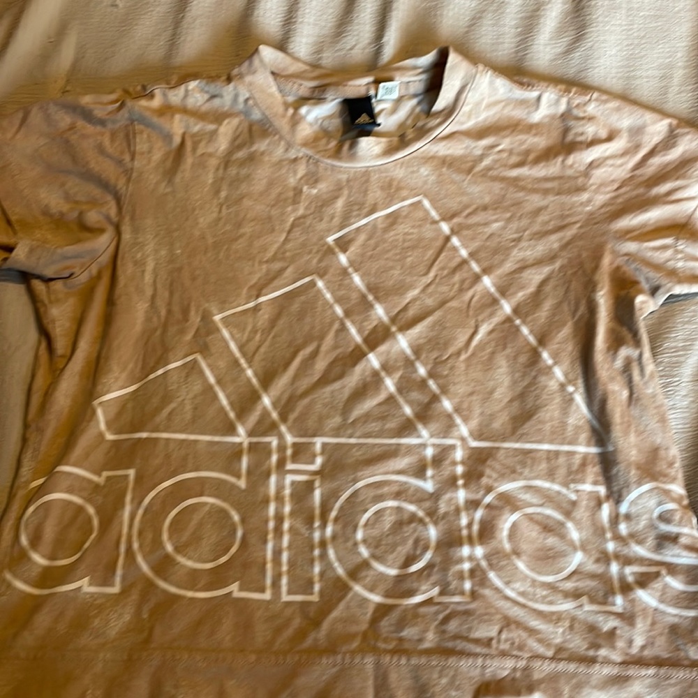 Women’s Adidas cropped tee.